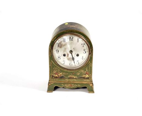 An early 20th Century green japanned mantle clock, with silvered arabic dial, and german movement, striking on a gong, 29cms 