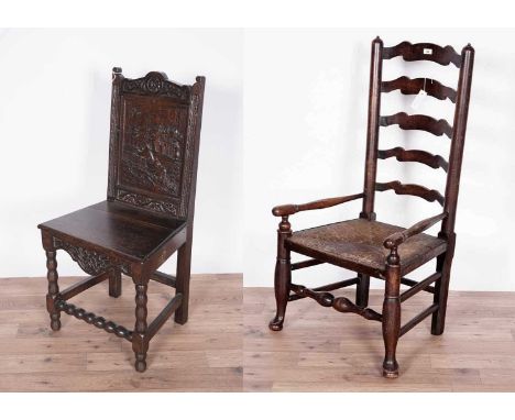 A decorative Victorian carved oak hall chair with panelled back, depicting a hunting scene in relief, within foliate carved s