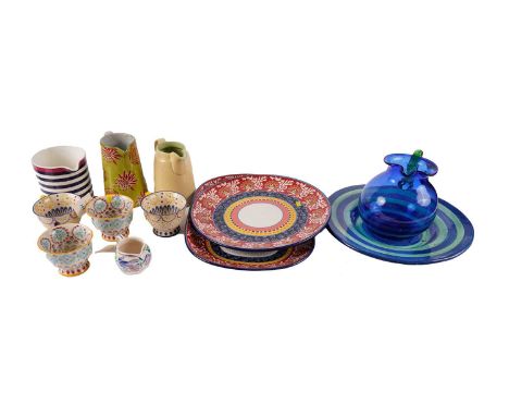 A selection of contemporary decorative ceramic and glass ware, including: four teacups of large proportions by Anthropologie,