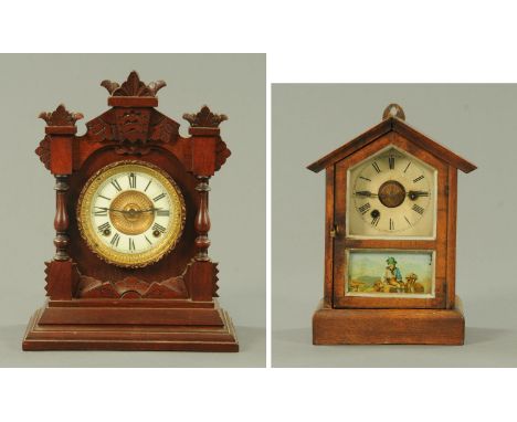 An Ansonia walnut gingerbread clock, and an American mantle clock, both with two-train movements and wooden cases.  Tallest 3