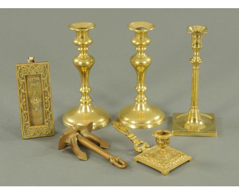 A pair of Victorian brass candlesticks, with push rod ejectors, a single candlestick, chamber stick, letter box surround and 