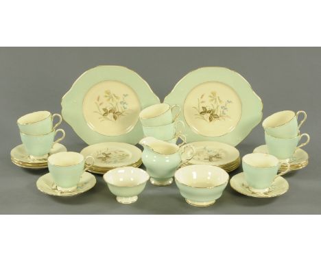 A Paragon part tea service, comprising 9 cups and side plates, 8 saucers, 2 sugar bowls, milk jug and 2 sandwich plates.  