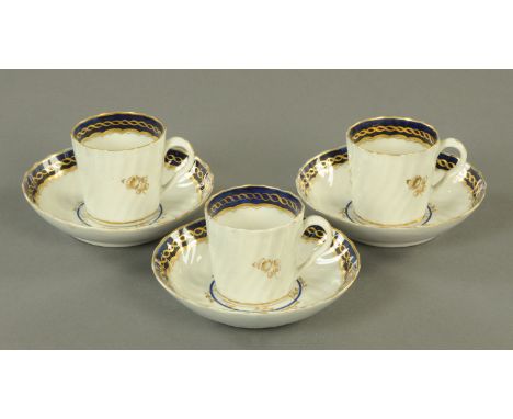 Three late 18th/early 19th century cups and saucers, with moulded bodies, probably Worcester.