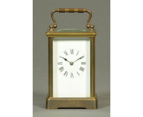 An Edwardian brass carriage clock, French, timepiece only.  Height excluding carrying handle 11.5 cm. 