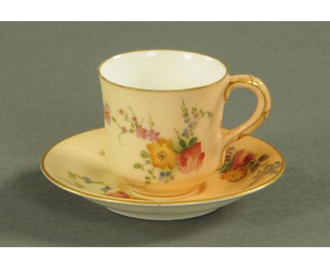 A Royal Worcester miniature cabinet cup and saucer, date code for 1907, with floral spray decoration against a blush ground w