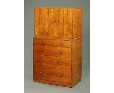 A Heals walnut inverted bowfront cupboard on chest, well figured and with four graduated drawers with knob handles.  Width 91