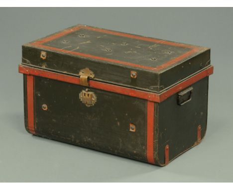 An antique tin trunk, with original paintwork.  Width 63 cm. 