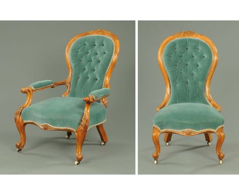 A pair of Victorian walnut ladies and gentleman's chairs, with exposed scroll carved showframes, deep buttoned backs, upholst