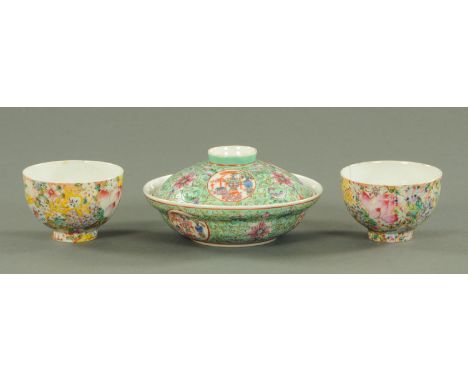 A Chinese Famille Rose bowl and cover, 20th century, each piece with roundels of precious objects flanked by lotus and tight 