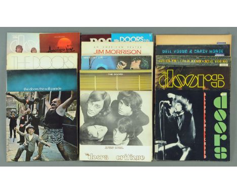 11 albums by The Doors, to include "Critique", "Strange Days", "The Soft Parade", "Waiting For The Sun", "Morrison Hotel" and