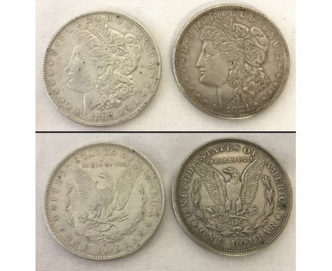 2 American Morgan silver dollars; 1884 and 1921.  Obverse portraying portrait of Liberty and an eagle with outstretched wings
