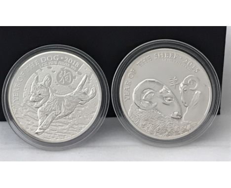 2 Chinese zodiac 1 ounce silver £2 coins.  2015 The Year Of The Sheep and 2018 The Year Of The Dog. Both in clear capsule cas