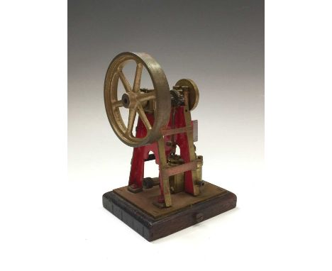 Live Steam Pumping Engine. A scratch built pumping engine on brass base on wooden plinth, approx. 6" high.