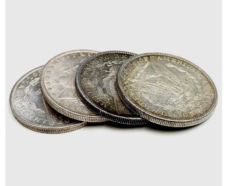 USA Morgan Silver Dollars. A run of four US Silver Dollars: 1883.0.; 1885.0.; 1886; &amp; 1887 in approx. shiny EF condition