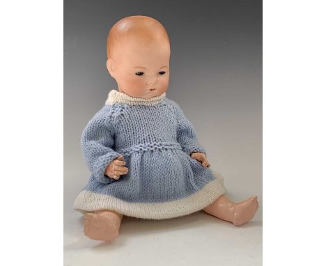German Porcelain Faced Doll - An attractive porcelain faced doll marked 'A.M.Germany 541/ 3 1/2 K'