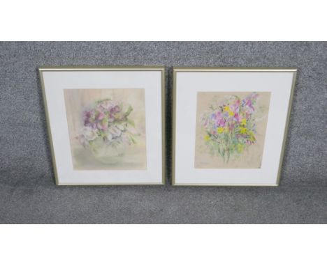 Two framed and glazed pastels on paper of bunches of spring flowers. Signed R. Raymont. H.42 W.87cm 