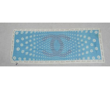 A large Chanel silk blue and white scarf with monogram and floral design. L.72 W.175cm 