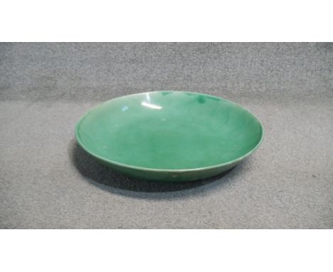 A large Chinese green crackle glaze ceramic charger. Diam.42cm 