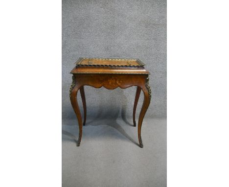A 19th century walnut and floral marquetry inlaid jardiniere stand with panel top revealing lift out zinc liner, all with orm