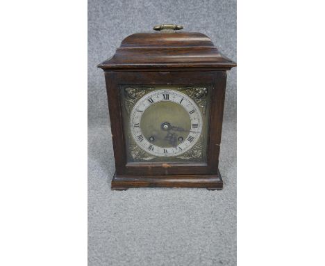 A Victorian Westminster chime mahogany and brass mantle clock. With key. H.30 W.23cm 