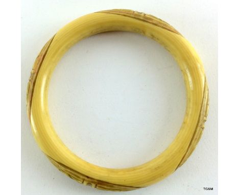 Carved 19th century ivory/bone bangle 9cm in diameter