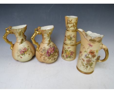 A PAIR OF ROYAL WORCESTER BLUSH IVORY STYLISED JUGS, each decorated with flowers, H 18 cm, together with two further jugs (4)