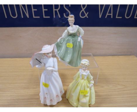 A ROYAL WORCESTER FIGURINE" GRANDMOTHERS DRESS " IN YELLOW COLOUR WAY WITH DOULTON "FAIR LADY " AND ANOTHER (3)