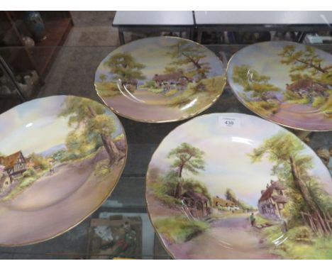A SET OF HAND PAINTED ROYAL WORCESTER CABINET PLATES - SIGNED