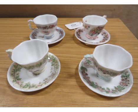 A SET OF ROYAL DOULTON BRAMBLY HEDGE SEASONS DEMITASSE CUPS AND SAUCERS