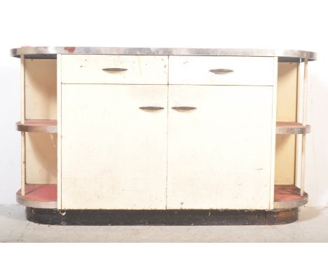 A 1950's metal and enamel painted two tone kitchen dresser sideboard in the manner of English Rose. Red and cream colourway w
