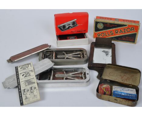 A pair of Rolls Razors - circa 1930's - pocket razor in metal casing press button to release. One with original box. Together
