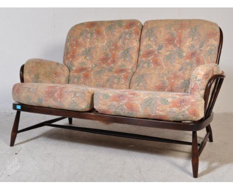 Lucian Ercolani - Ercol - Jubilee Range - A retro vintage 20th Century English beech and elm wood spindle back two seater sof