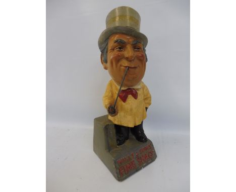 A Wills &amp; Sons' Fine Shagg 'Country Life' advertising figure of a man smoking a pipe, 14" tall. 
