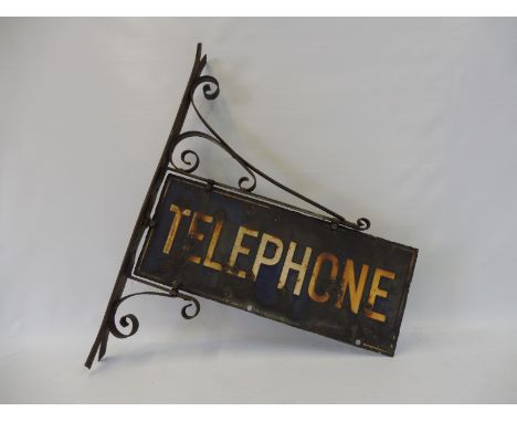 A 'Telephone' double sided enamel sign on original bracket, by repute from a post near Crudwell, Malmesbury, Wilts.