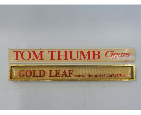 Two shelf advertisements for 'Gold Leaf', 10 x 1 1/4" and Tom Thumb, 11 x 1 1/4".