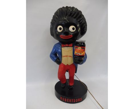 A rare Robertsons Golly shop advertising figure in the form of a lamp, 26 1/2" high.