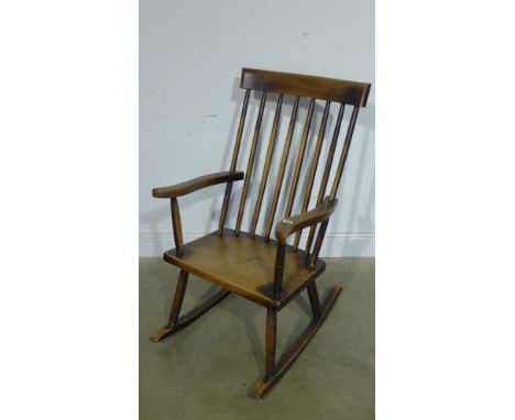 A 19th century sycamore, ash and elm country stick back armchair