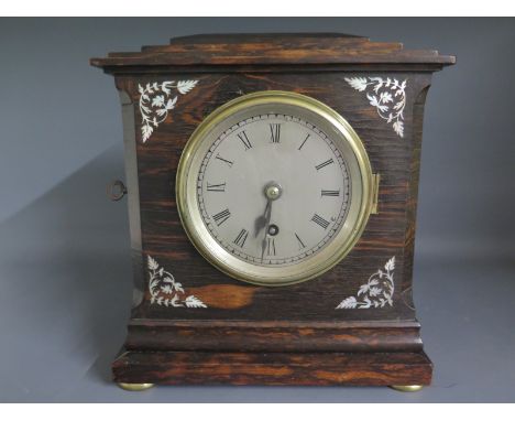 A 19th century coromandel and mother of pearl bracket clock with an 11cm silvered dial and drop shoulder fusee driven movemen