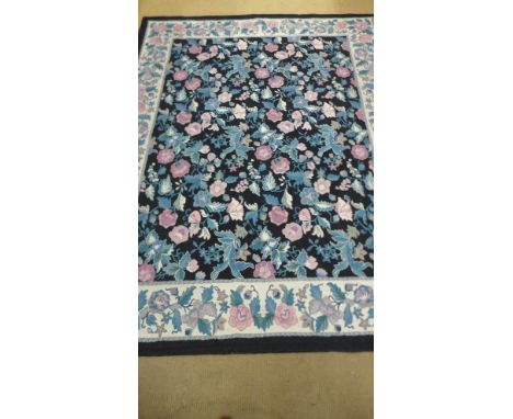 A black ground find handmade Abusson carpet - 3.06m x 2.44m 