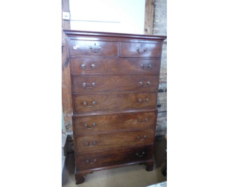 A Georgian mahogany chest on chest with two short over six long drawers on shaped bracket feet - Height 187cm x Width 110cm x