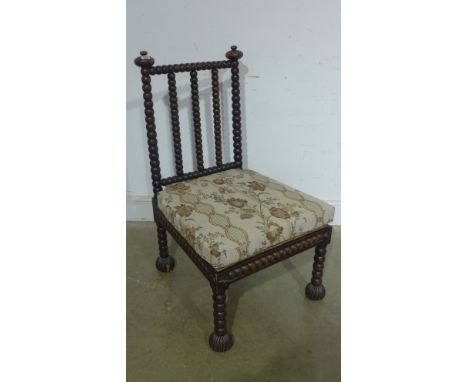 A Beech side chair with bobbin turned back and legs