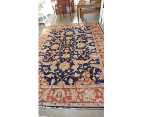 A blue ground hand made Zeigler carpet - 3.57m x 2.64m 