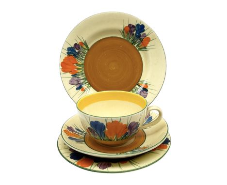 Clarice Cliff Bizarre Crocus pattern teacup trio, together with side plate, D17cm, all with stamped factory marks beneath (4)