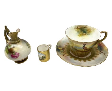 Early 20th century Royal Worcester cabinet cup and saucer, painted with a peacock, together with Royal Worcester ewer hand de