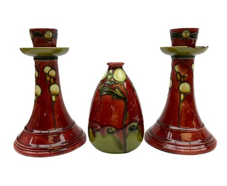 Minton Secessionist vase, with tube-lined stylised flower head decoration upon a red and green ground, printed mark to base '