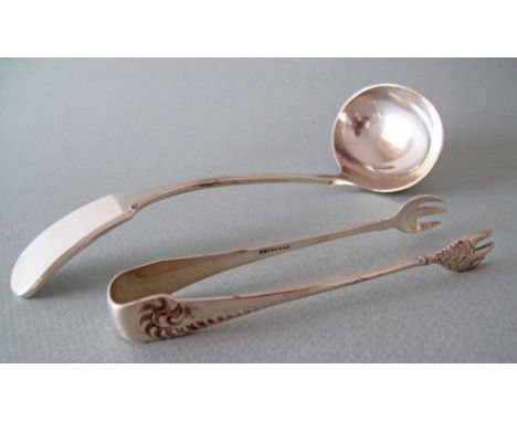 A silver sauce ladle and a pair of sugar tongs. Both hallmarked.
Reserve:€30.
In-House Packing &amp; Shipping Worldwide.