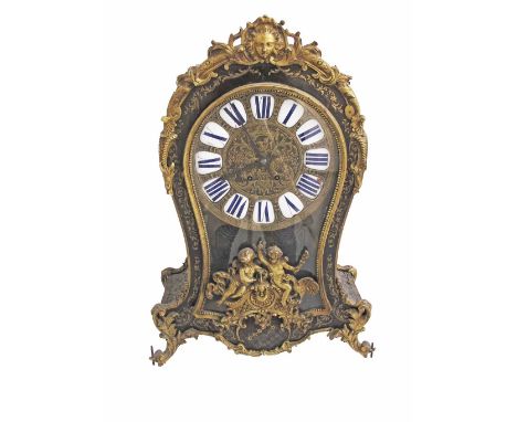 A French Louis XV black ormolu-mounted Boullework bracket clock, brass inlaid tortoiseshell case, with Cupid decoration on th