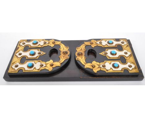 A Victorian 19th century mahogany &amp; brass bound book slide. The book ends having foliate shaped brass embellishments with