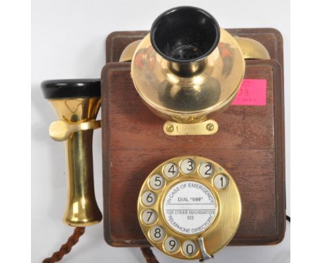 A vintage 20th century wood wall telephone in the manner of 1920s GPO 121 model. With brass fittings. Measuring approx. 20 x 