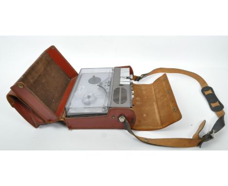 A retro vintage 20th Century Uher München 4000 report monitor in leather case. Measures approx. 25cm tall.